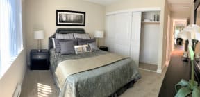 2 bedroom model with queen size bed, night stands with lamp,
standard closet