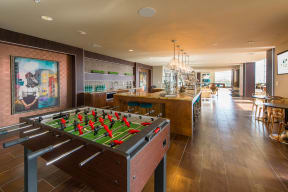Foosball Table  at The Heights at Woodland Park Apartments, The Barvin Group, Houston, 77009