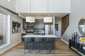 Kitchen Island In Penthouse At Revel Apartments In Minneapolis, MN