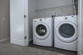 Convenient closet off the main living area with full size front load washer/dryer.
