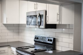 Microwave & Stove/Oven | Sixty58 Townhomes in Sacramento, CA