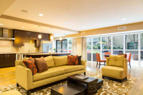 Apartments for Rent in Irvine - Astoria at Central Park West Lobby Sofa, Coffee Table and Open Kitchen Area