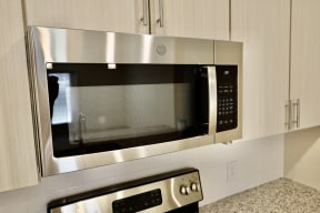 Apartments for Rent in Ladson SC - Fully Equipped Kitchen with Stylish Interiors and Convenient Amenities such as Fridge, Stove, and Microwave