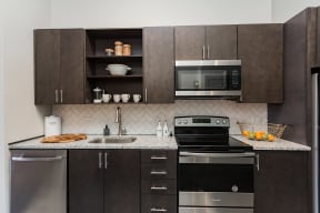 Espresso Cabinetry with Under Cabinet Lighting