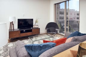 furnished living room with tv