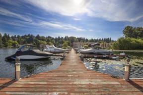 Villaggio on Yarrow Bay dock with boats on Lake Washington