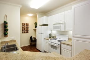 Apartments for Rent in Rancho Cucamonga CA - Spacious Kitchen Fully Equipped with Amenities Such As Fridge, Stove, and Microwave