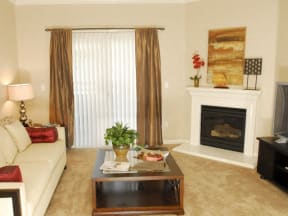 Living room with fireplace Apartments in Modesto, CA l Villas at Villaggio