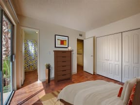 Private Master Bedroom With Attached Balcony at Fountain Plaza Apartments, Tucson, Arizona