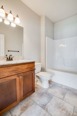 Bathroom With Tile-Style Flooring