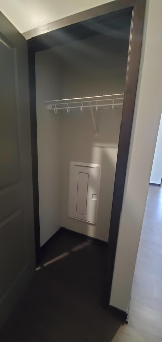 Haven-at-Uptown-Lincoln-NE-2-bedroom-apartment-Aura-Mocha-finish-06 Coat closet off of the living area in a two bedroom apartment