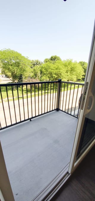 Balcony off of the living area that overlooks to park in Lincoln, NE