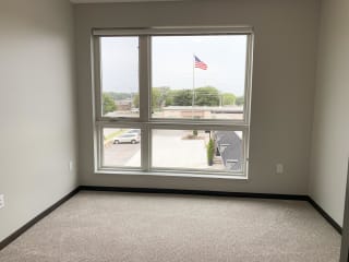 Bedroom with large window with view outside to north Lincoln, Nebraska