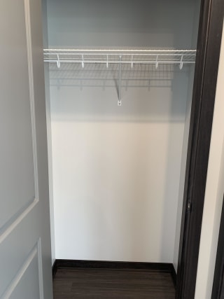 Empty coat closet in a two-bedroom apartment at Haven at Uptown