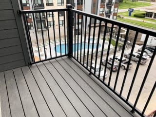 balcony overlooking community swimming pool at Haven at Uptown in Lincoln Nebraska