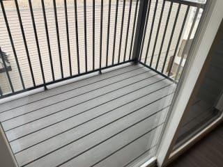 Exterior balcony off of the living space in the Nest studio floor plan at Haven at Uptown