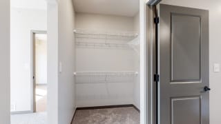 Closet space providing storage in the Bliss floor plan at Haven at Uptown in Lincoln, NE