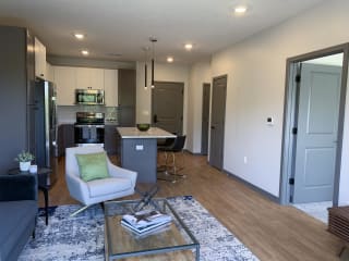 Open concept living area with ample room and sunlight in the Bliss floor plan at Haven at Uptown in Lincoln.