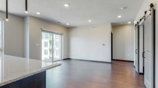 Melody (1 bed, 1 bath) in Mocha finish Spacious living-dining space at Haven at Uptown in Lincoln, NE