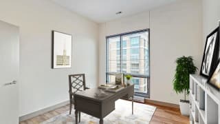 Bright and spacious bedroom that could be used as home office with floor-to-ceiling windows a 2 bedroom penthouse floor plan Midtown Crossing Apartments Omaha Bright and spacious bedroom that could be used as home office with floor-to-ceiling windows a 2 bedroom penthouse floor plan Midtown Crossing Apartments Omaha