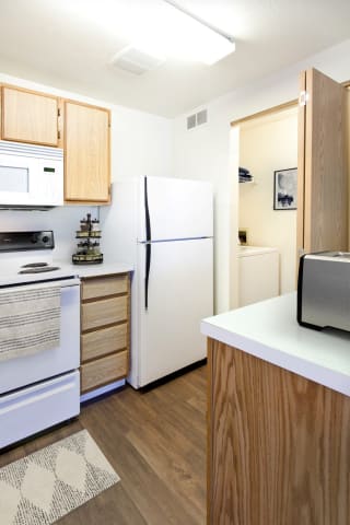 GoGo West Apartments 2 Bed Floor Plan Kitchen and Laundry Closet