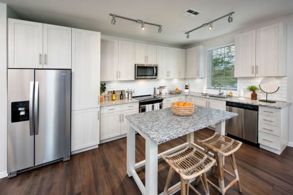 Style Kitchen With Breakfast Bar at Town Trelago, Florida