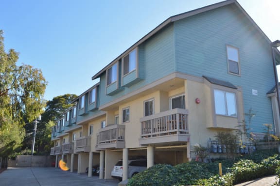 Exterior View of Pacific Vista Apartments in Monterey, CA with Nature-Friendly Surroundings