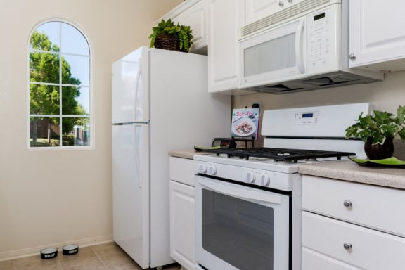 White Appliances In Kitchen at The Landing, California, 92154