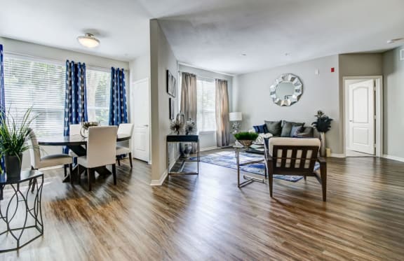 spacious living room with hardwood floor at tuscany bay apartments, westchase tampa fl