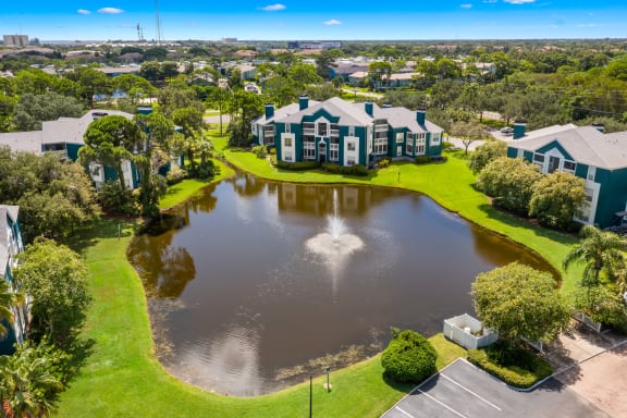 Aerial View Of Apartment Homes Overlooking The Pond &amp; Fountain