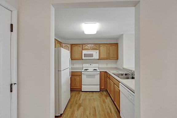 rivers edge apartments kitchen oak cabinetry