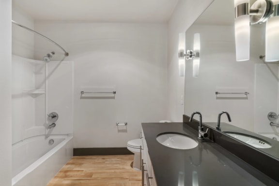 Large Bathroom with Hardwood  Flooring at ArtHouse in Seattle, Washington 98121