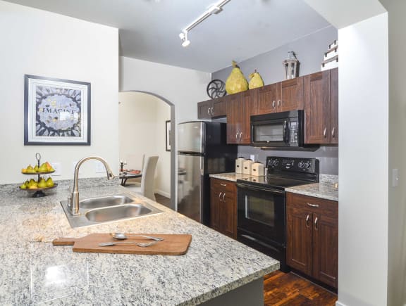 Kitchens Feature Stainless Steel Appliances, Custom Cabinetry  Spacious Islands
