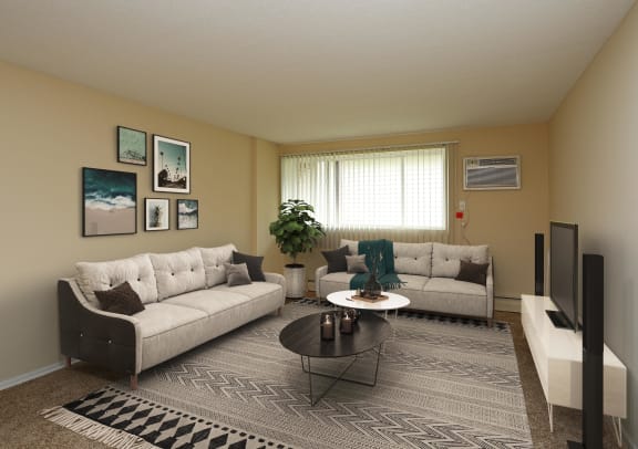 Spacious living area with ample natural lighting.