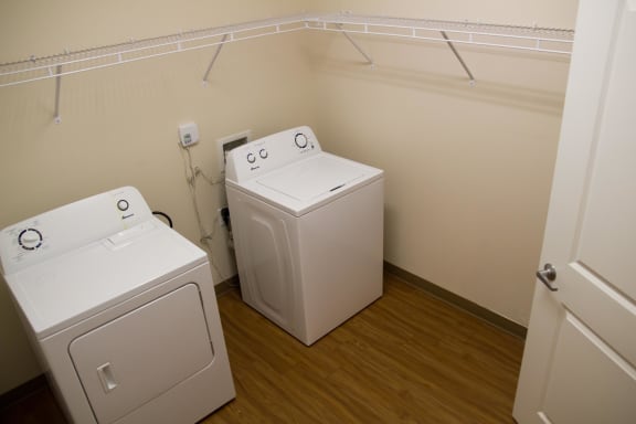 In-unit washer/dryer with a large closet for storage.