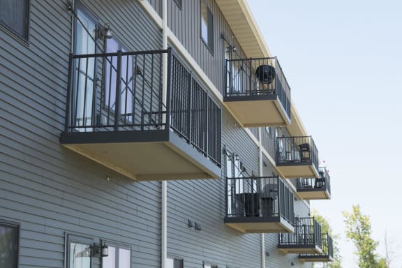 Exterior of Deer Ridge Apartments&#x27; private balconies and patios.