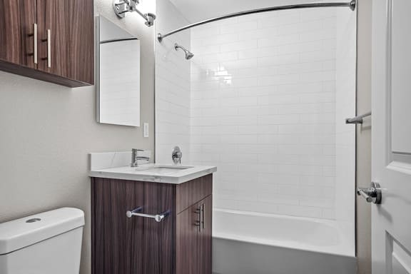 Renovated Bathrooms With Quartz Counters Renovated Bathrooms With Quartz Counters at Peninsula Pines Apartments, South San Francisco, CA