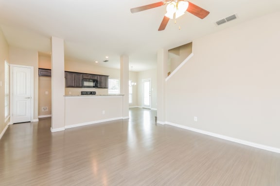 Living space area with ceiling fan at Brooklyn Village Forney, Texas