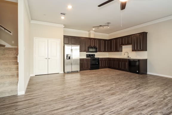 Open Concept Kitchen with Appliances and Granite Countertops