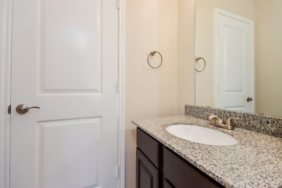 Designer Granite Countertops In All Bathrooms Designer Granite Countertops In All Bathrooms at Villas at Kings Harbor, Kingwood, TX