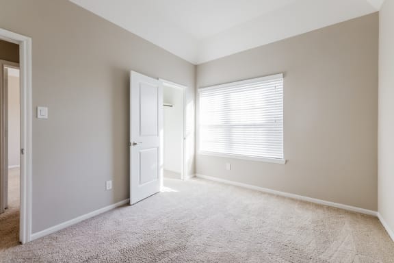 Spacious Primary Bedroom with Walk-In Closet and Double Vanity Bathroom