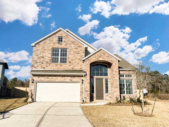 Exterior View With Garage at Lakeside Conroe, Texas, 77356