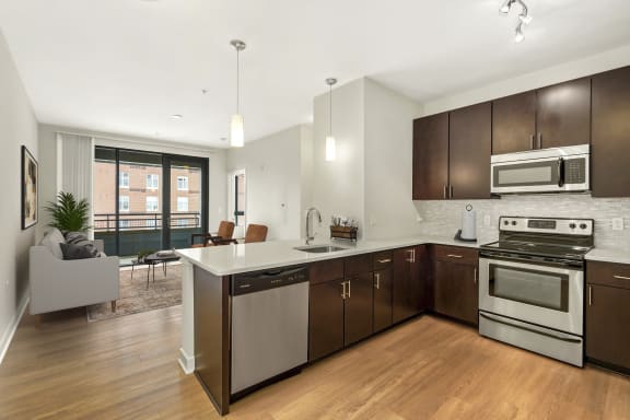 Sleek, high-contrast kitchensat The Maxwell Apartments, Arlington, VA