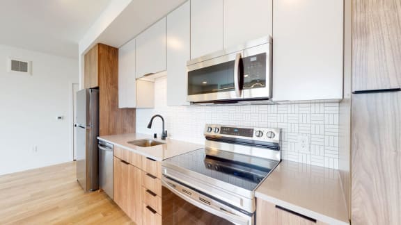 Fully Furnished Kitchen With Stainless Steel Appliances Fully Furnished Kitchen With Stainless Steel Appliances at The Mason, St. Paul
