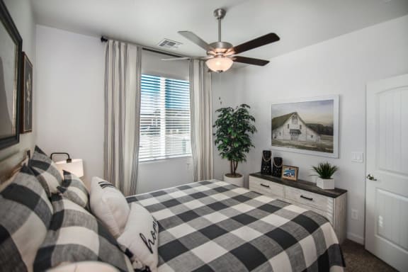 Bedroom with ceiling fan at Mulberry Farms, Prescott Valley, Arizona