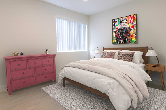 a bedroom with a pink dresser and bed