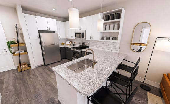 Stunning and large kitchen with granite counters, stainless steel appliances, and bar stools at Link Apartments&#xAE; 4th Street in Downtown Winston Salem, NC