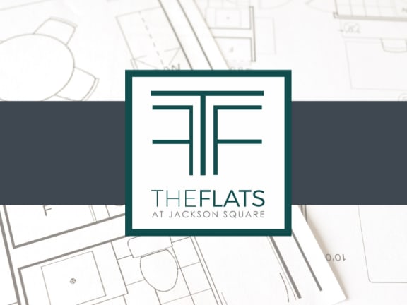 Architectural blueprint under logo for The flats at Jackson square