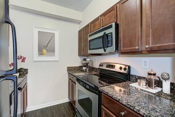 Fully Furnished Kitchen With Stainless Steel Appliances at Columbia Uptown, Washington