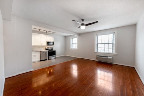 gorgeous hardwood floor in living room leading to kitchen at Connecticut Plaza Apartments, 2901 Connecticut Ave NW, Washington, DC, 20008